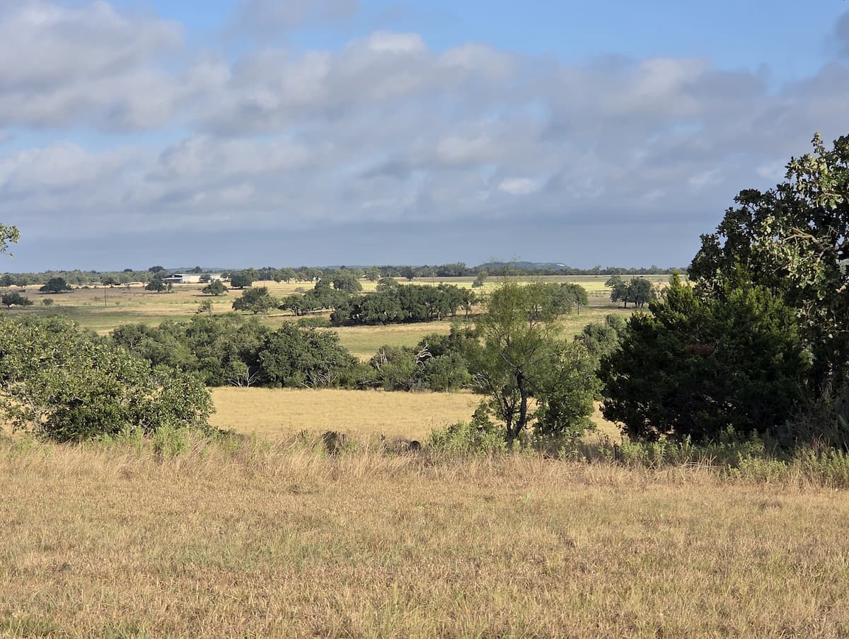 A panoramic Hill Country view from the back porch at Porter Haus